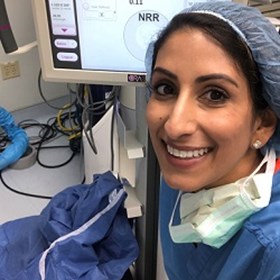 Preeya smiling in surgery